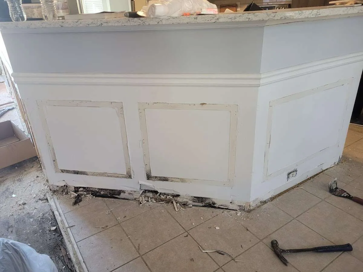 Water damage and mold on kitchen during Storm Damage Restoration in Spirit Lake